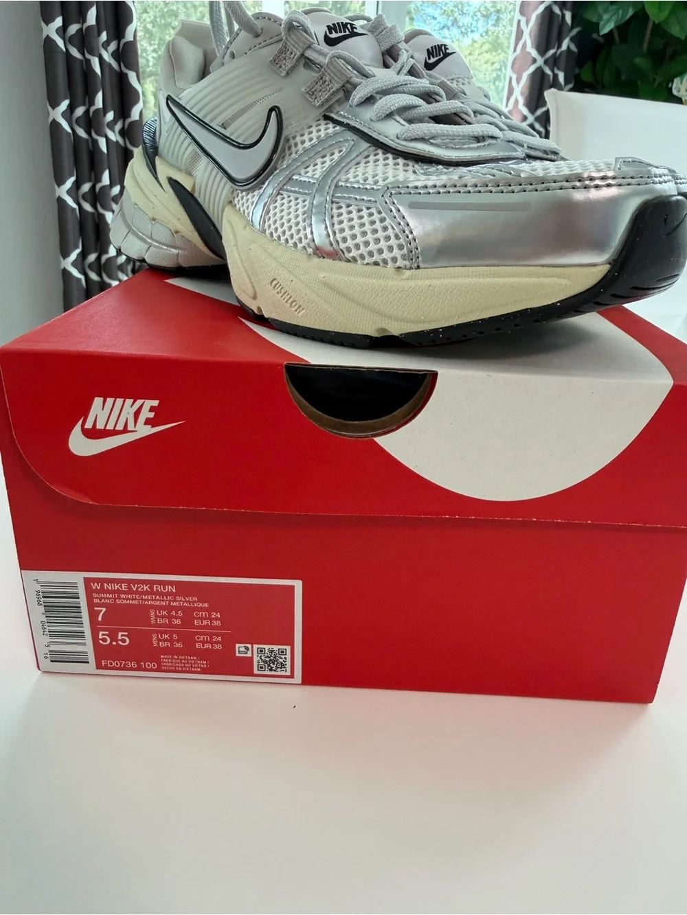 Women Nike V2K sneakers.